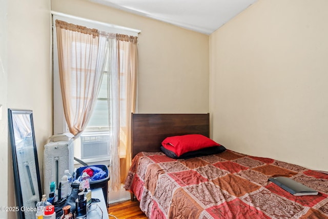373 Delaware Ave, Albany, NY 12209 - bedroom with wood finished floors and cooling unit