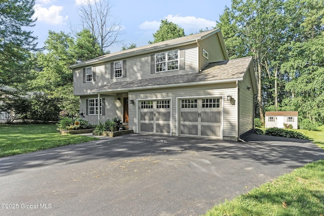 3 Pineridge Ct, Greenfield, NY 12833 - view of front of property with asphalt driveway, a shed, and a front yard