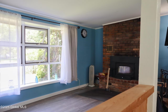 103 Seven Oaks Rd, Caroga, NY 12032 - living room featuring wood finished floors and ornamental molding