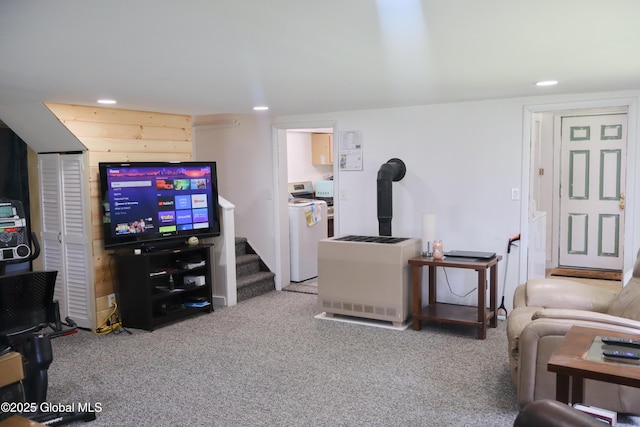 103 Seven Oaks Rd, Caroga, NY 12032 - carpeted living area with recessed lighting, stairway, and washer and dryer