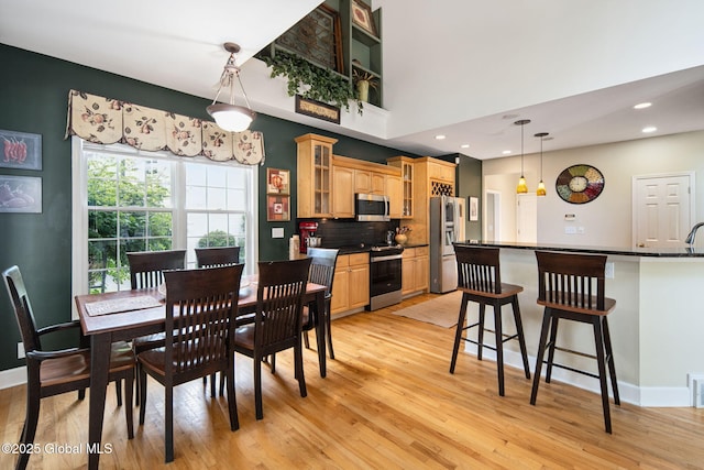 18 Beresford Rd, Clifton Park, NY 12019 - dining area with light wood finished floors and recessed lighting