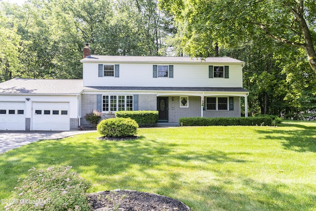 8 Burning Bush Blvd, Clifton Park, NY 12019 - traditional home featuring an attached garage, a chimney, a front lawn, and driveway
