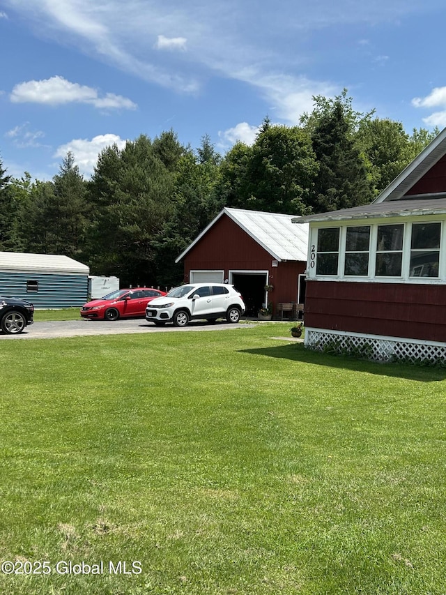 200 State Route 29a, Salisbury, NY 13454 - view of grassy yard featuring a detached garage