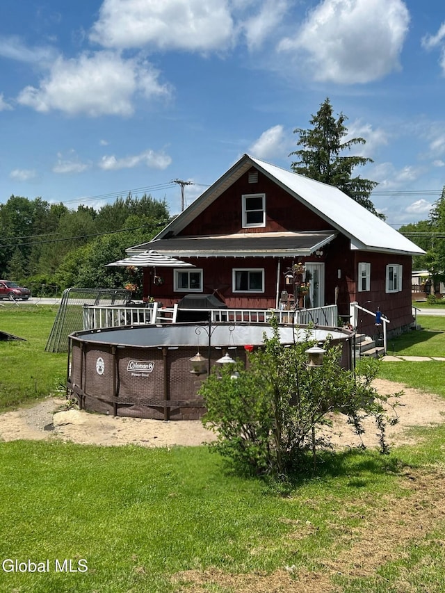 200 State Route 29a, Salisbury, NY 13454 - rear view of property with a yard and a porch