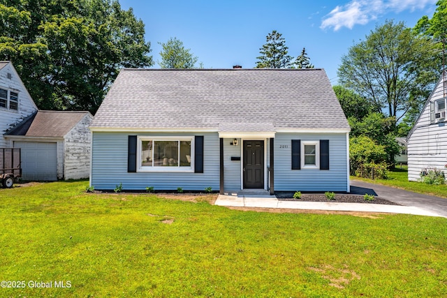 2095 Fiero Ave, Rotterdam, NY 12303 - cape cod home featuring a front lawn and a shingled roof