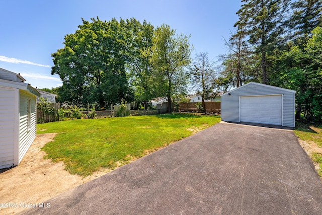 2095 Fiero Ave, Rotterdam, NY 12303 - view of yard with an outbuilding, a detached garage, and driveway