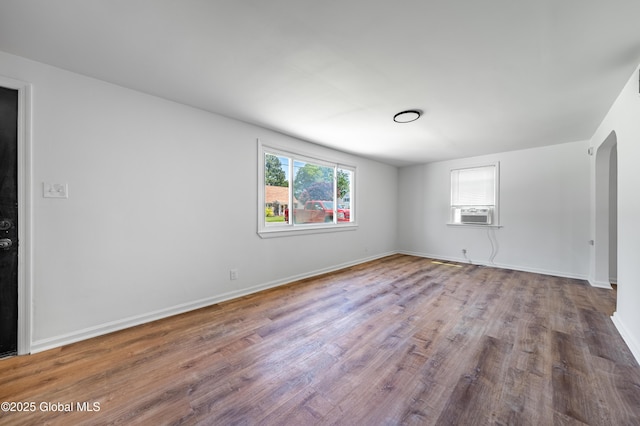 2095 Fiero Ave, Rotterdam, NY 12303 - unfurnished room featuring arched walkways and wood finished floors