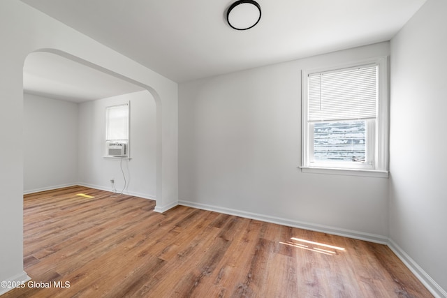 2095 Fiero Ave, Rotterdam, NY 12303 - spare room with wood finished floors and arched walkways