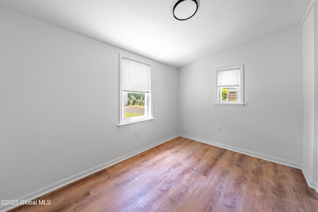 2095 Fiero Ave, Rotterdam, NY 12303 - spare room with wood finished floors and vaulted ceiling