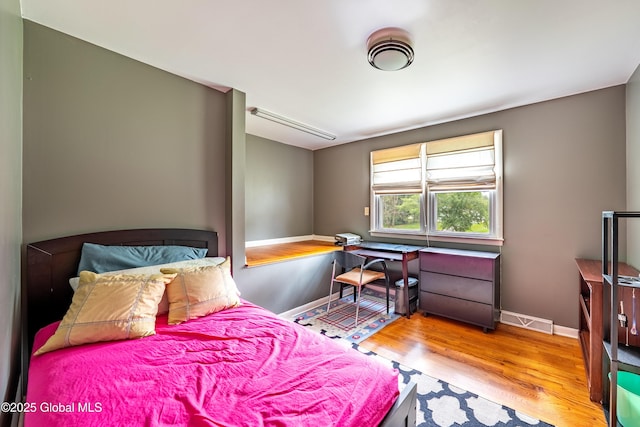 973 Avon Crest Blvd, Niskayuna, NY 12309 - bedroom featuring wood finished floors and baseboards