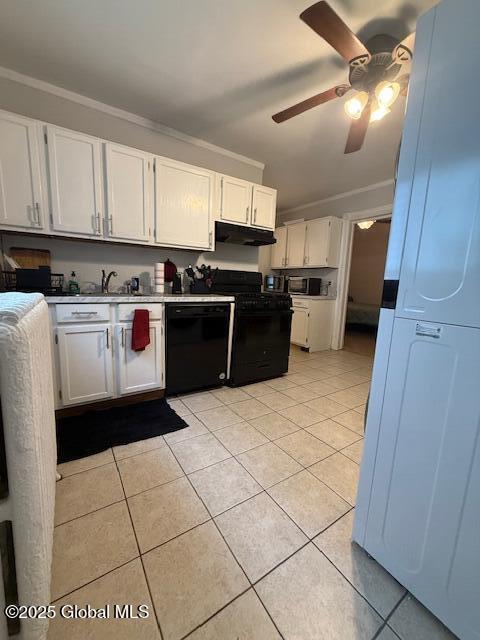 527 Pawling Ave, Troy, NY 12180 - kitchen with black appliances, under cabinet range hood, white cabinets, ceiling fan, and light tile patterned floors