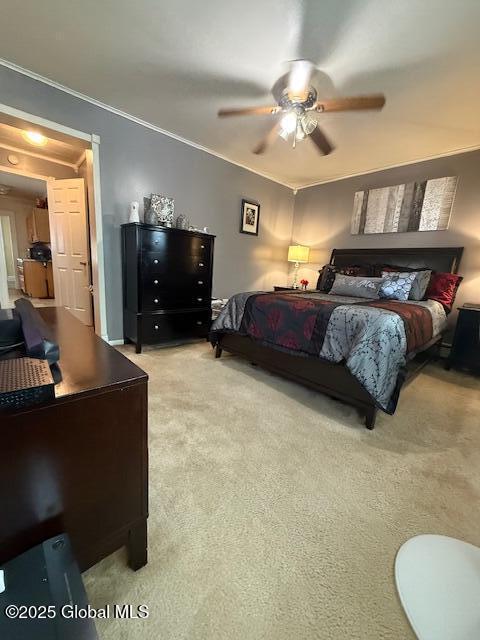 527 Pawling Ave, Troy, NY 12180 - bedroom with light colored carpet, crown molding, and a ceiling fan