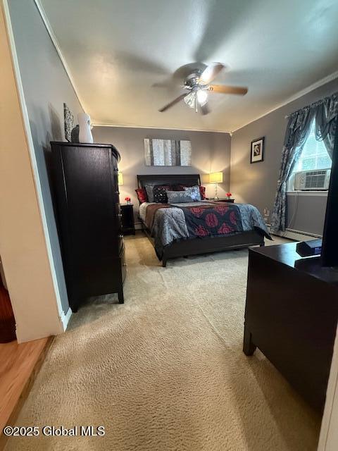 527 Pawling Ave, Troy, NY 12180 - bedroom featuring cooling unit, a ceiling fan, and light carpet