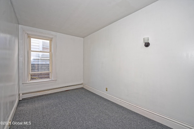 850 Peoples Ave, Troy, NY 12180 - spare room featuring a baseboard heating unit and lofted ceiling