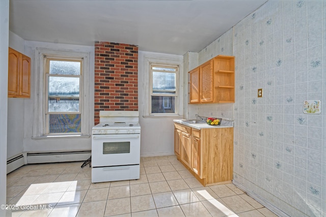850 Peoples Ave, Troy, NY 12180 - kitchen featuring white range with gas stovetop, light tile patterned floors, light countertops, and open shelves