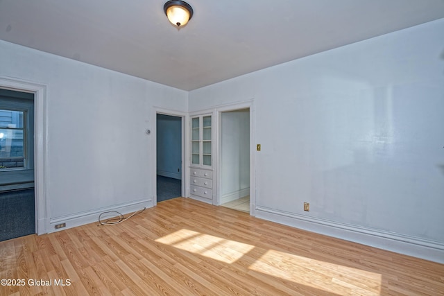 850 Peoples Ave, Troy, NY 12180 - empty room featuring light wood-style floors