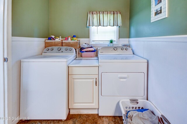 1330 State Highway 67, Johnstown, NY 12095 - laundry room featuring a wainscoted wall, separate washer and dryer, and cabinet space