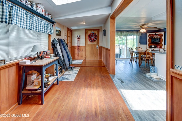 1330 State Highway 67, Johnstown, NY 12095 - foyer entrance featuring wood finished floors, wainscoting, ceiling fan, and wooden walls
