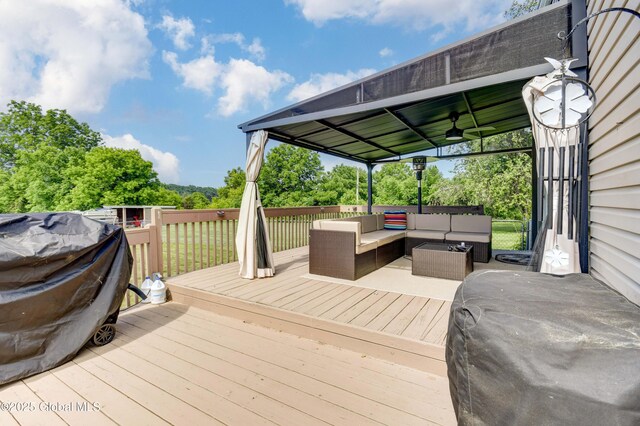 1330 State Highway 67, Johnstown, NY 12095 - wooden deck with ceiling fan, an outdoor living space, and a gazebo