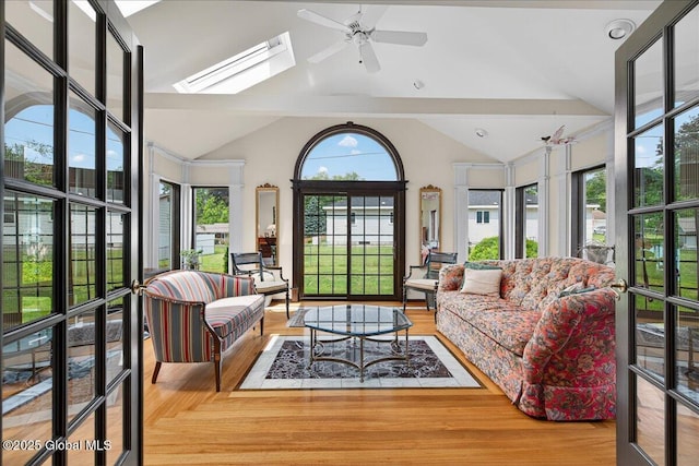 62 Pheasant Ridge Dr, Colonie, NY 12211 - sunroom featuring vaulted ceiling and a skylight