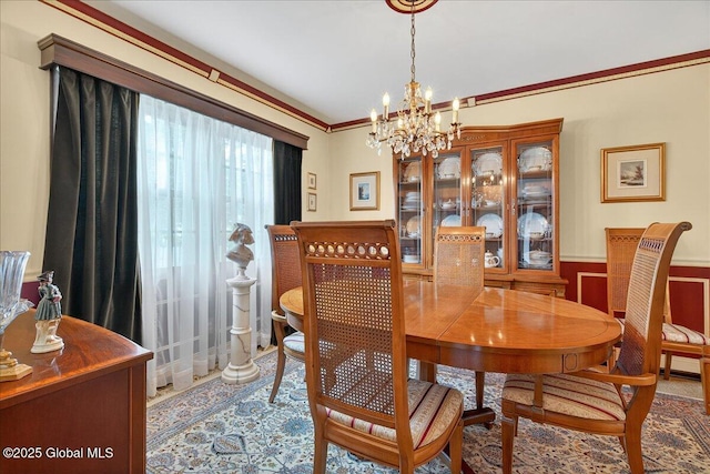 62 Pheasant Ridge Dr, Colonie, NY 12211 - dining room featuring a chandelier, wainscoting, and crown molding