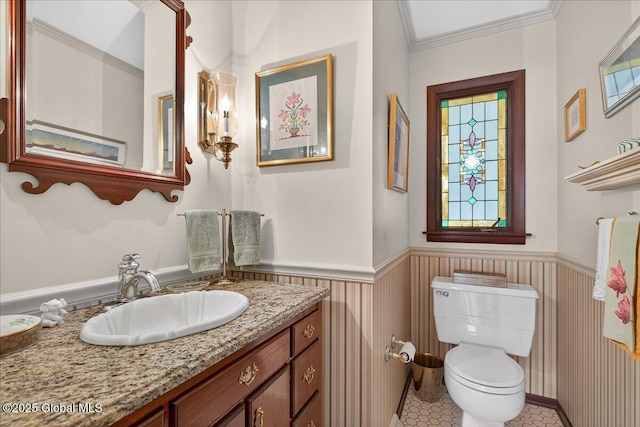 62 Pheasant Ridge Dr, Colonie, NY 12211 - half bathroom with wainscoting, vanity, tile patterned flooring, and ornamental molding
