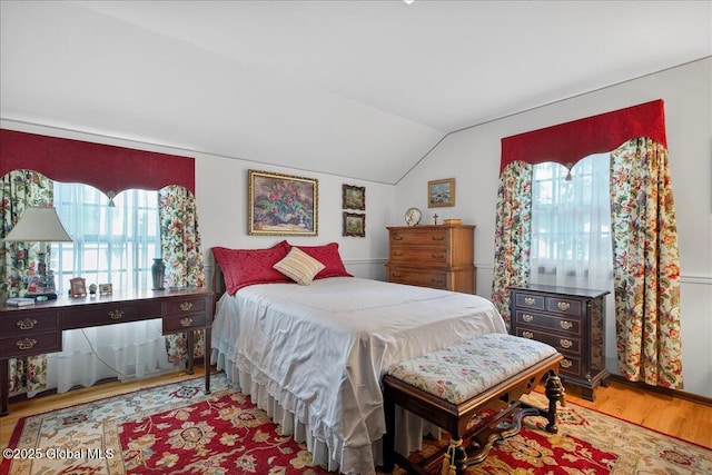 62 Pheasant Ridge Dr, Colonie, NY 12211 - bedroom with wood finished floors and vaulted ceiling