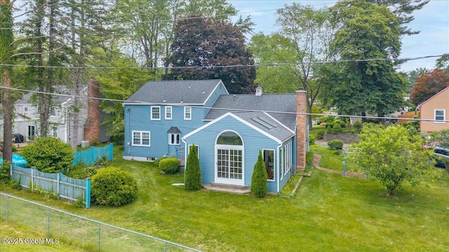 62 Pheasant Ridge Dr, Colonie, NY 12211 - rear view of property with a chimney