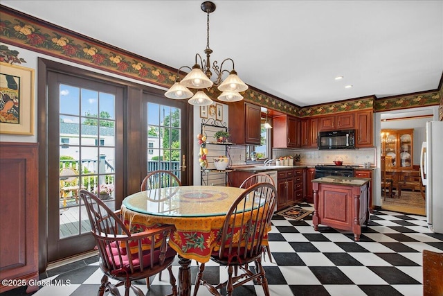 62 Pheasant Ridge Dr, Colonie, NY 12211 - dining area featuring dark floors, a chandelier, and recessed lighting