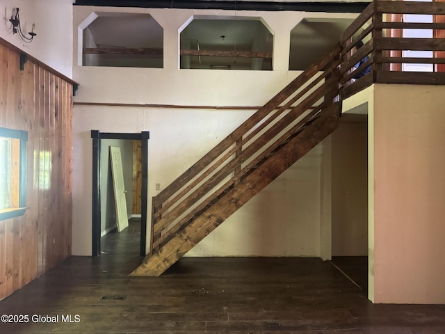 3190 State Highway 10, Johnstown, NY 12095 - staircase featuring wood-type flooring, plenty of natural light, and a high ceiling