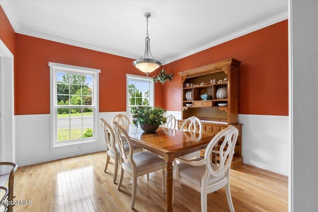 14 Maplecrest Dr, Ravena, NY 12143 - dining space with a wainscoted wall, light wood-style flooring, and crown molding