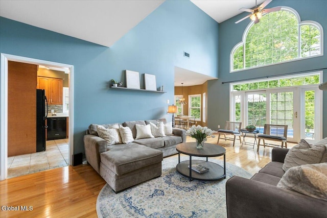 14 Maplecrest Dr, Ravena, NY 12143 - living area with a towering ceiling, ceiling fan, and light wood finished floors