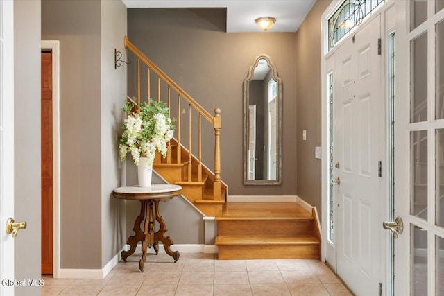 14 Maplecrest Dr, Ravena, NY 12143 - foyer with tile patterned flooring and stairs