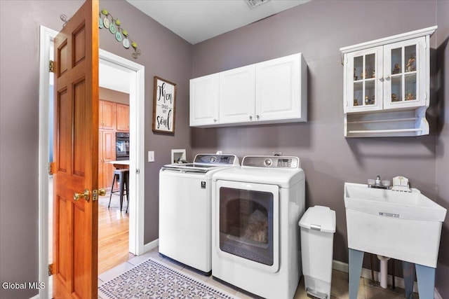 14 Maplecrest Dr, Ravena, NY 12143 - laundry room featuring cabinet space and washer and dryer
