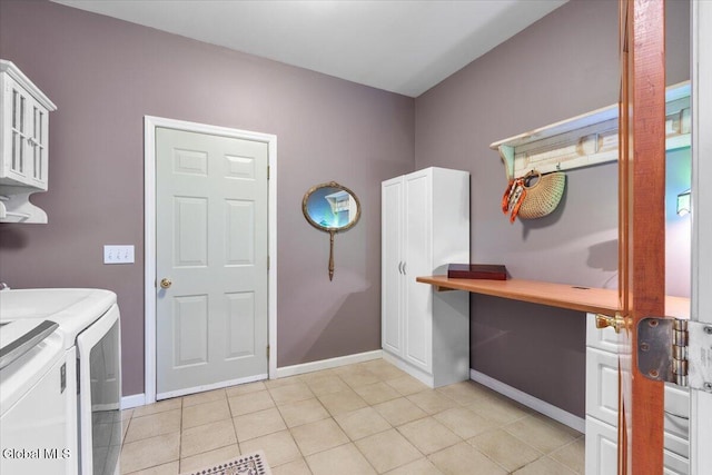 14 Maplecrest Dr, Ravena, NY 12143 - laundry area featuring washer and dryer, cabinet space, and light tile patterned floors