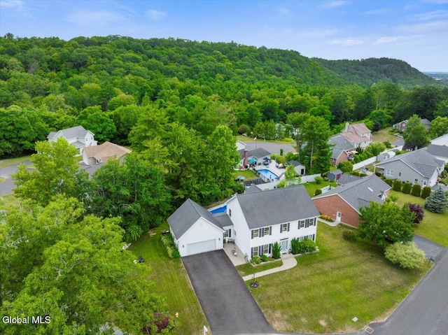 14 Maplecrest Dr, Ravena, NY 12143 - aerial perspective of suburban area with a forest