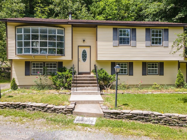 257 Lake Rd, Cobleskill, NY 12043 - split foyer home with a front lawn