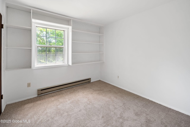 257 Lake Rd, Cobleskill, NY 12043 - carpeted empty room featuring baseboard heating and baseboards