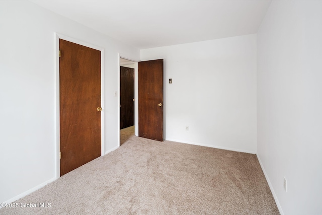 257 Lake Rd, Cobleskill, NY 12043 - spare room with carpet and baseboards