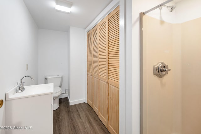 257 Lake Rd, Cobleskill, NY 12043 - full bathroom featuring wood finished floors, vanity, and a shower