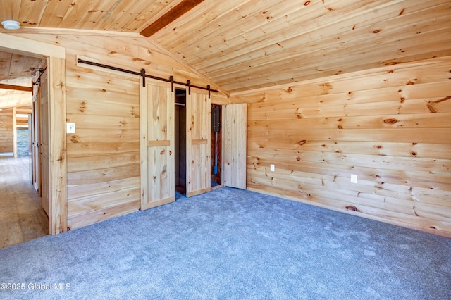 135 Lafayette St, Palatine Bridge, NY 13428 - unfurnished bedroom featuring wood ceiling, wood walls, a barn door, and carpet floors