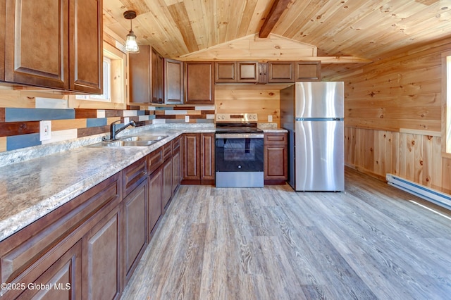 135 Lafayette St, Palatine Bridge, NY 13428 - kitchen with stainless steel appliances, light wood-type flooring, wooden ceiling, wooden walls, and brown cabinets