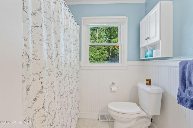 1 Tamarack Ln, East Greenbush, NY 12061 - full bath featuring tile patterned floors, a wainscoted wall, ornamental molding, and curtained shower