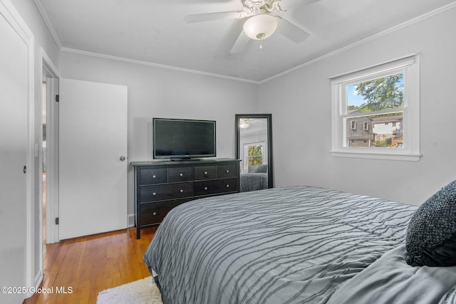 1 Tamarack Ln, East Greenbush, NY 12061 - bedroom with wood finished floors, multiple windows, crown molding, and a ceiling fan