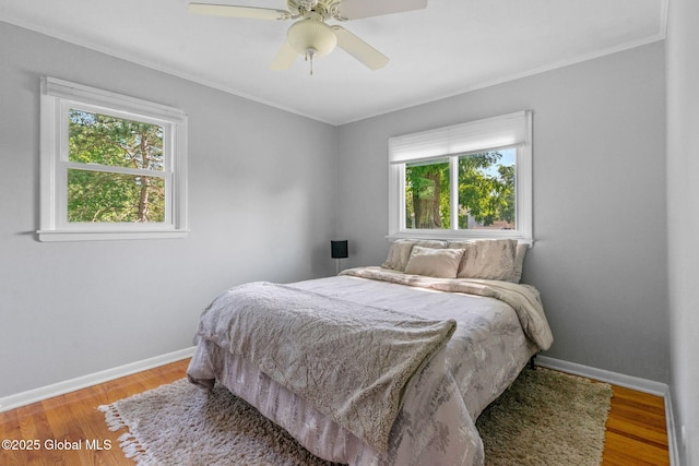 1 Tamarack Ln, East Greenbush, NY 12061 - bedroom featuring ornamental molding, wood finished floors, and a ceiling fan