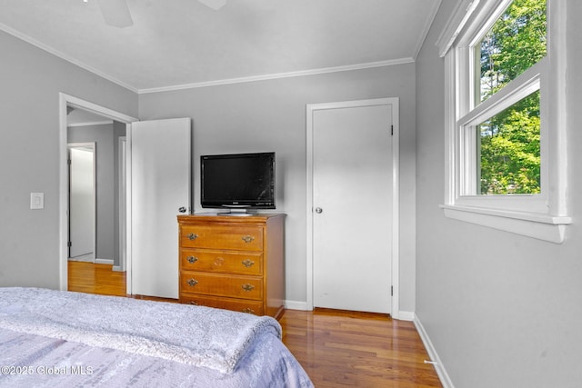 1 Tamarack Ln, East Greenbush, NY 12061 - bedroom featuring wood finished floors, multiple windows, crown molding, and a ceiling fan