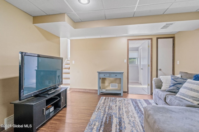 1 Tamarack Ln, East Greenbush, NY 12061 - living area featuring wood finished floors and a paneled ceiling