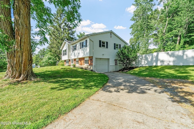 1 Tamarack Ln, East Greenbush, NY 12061 - view of front of property featuring a garage and driveway