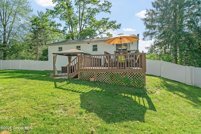 1 Tamarack Ln, East Greenbush, NY 12061 - rear view of house with a gazebo, a fenced backyard, and a wooden deck