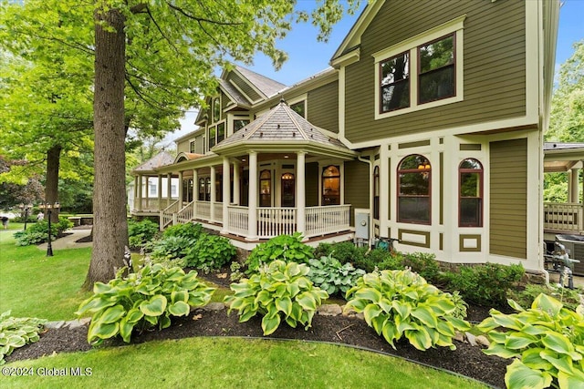 176 5th Ave, Saratoga Springs, Inside, NY 12866 - back of house with a porch and a yard